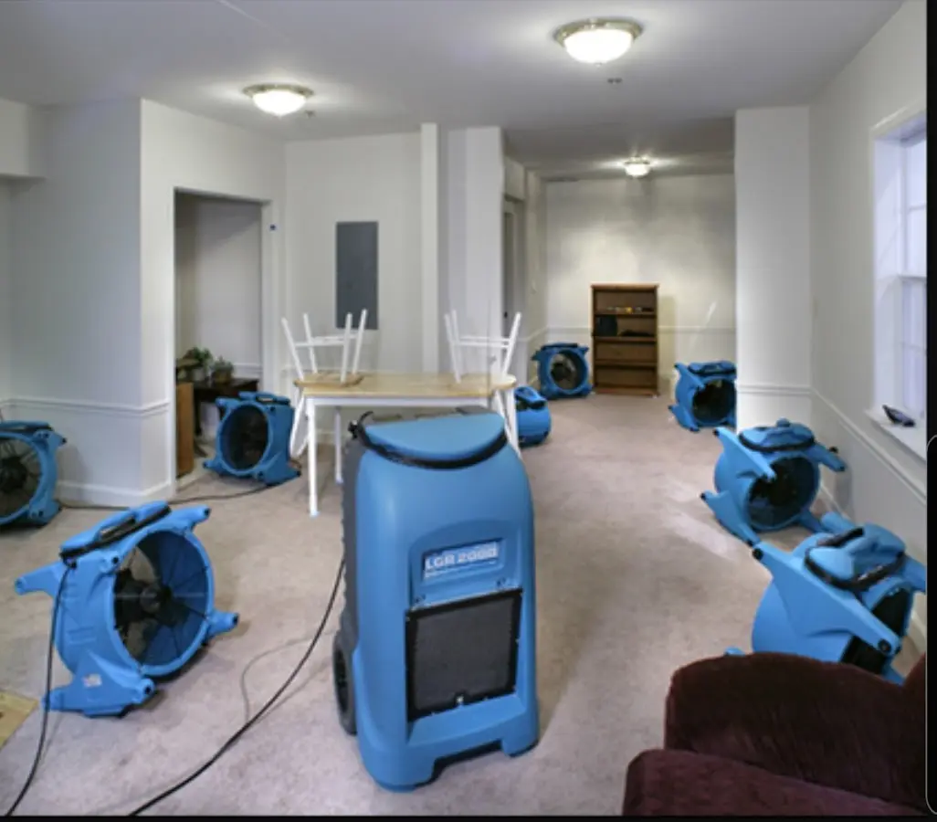 Air movers and dehumidifier setup for Water Damage Restoration in Millburn